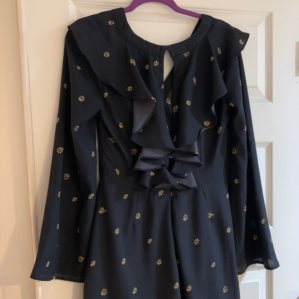 Top shop romper with long sleeves and ruffles